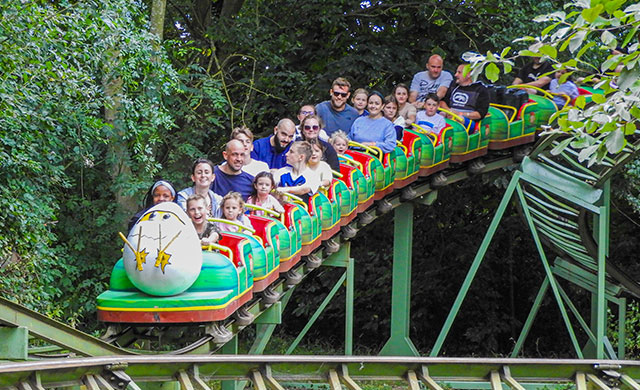 People on a rollercoaster